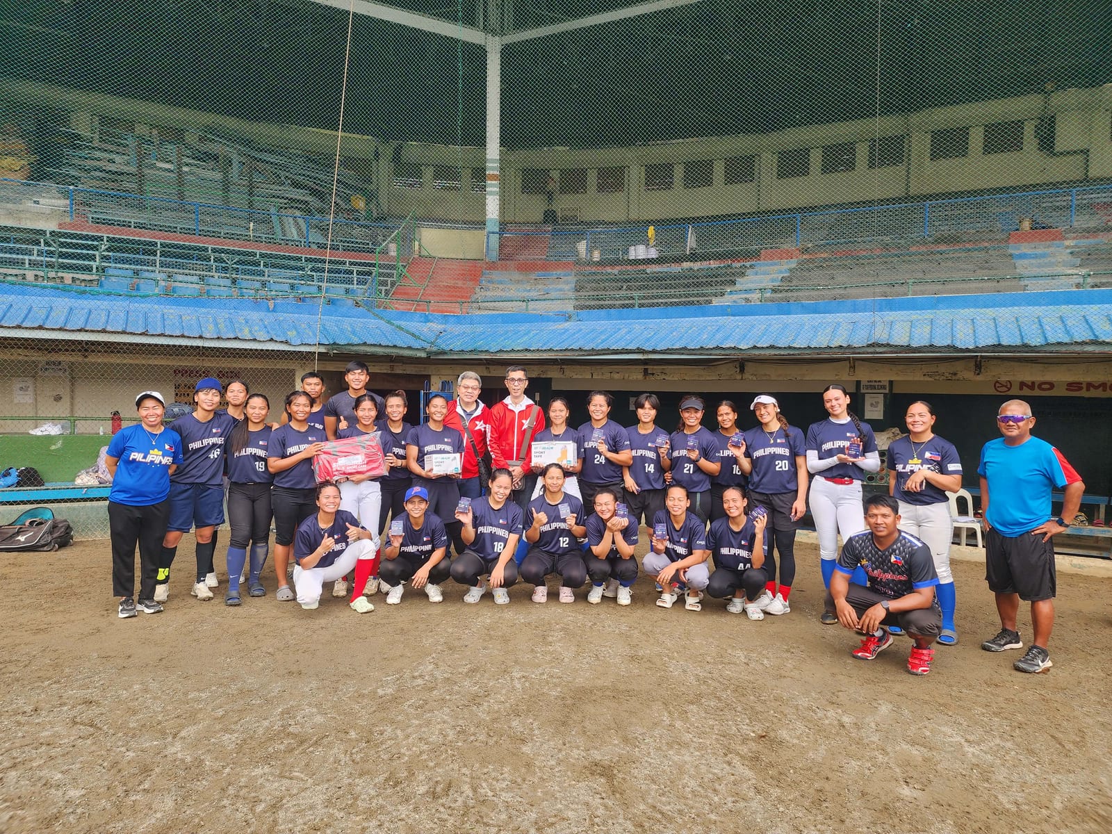 A Filipino women's softball team after practice in Manila